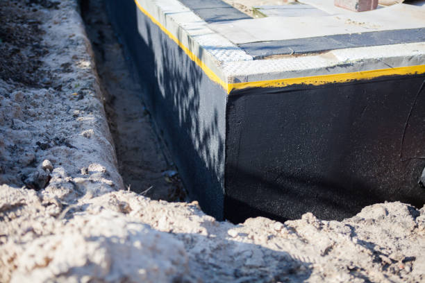 Professional Interior Drainage System technician working in Lawrenceburg, KY